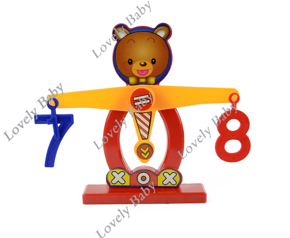 Развивающая игрушка Весы-медведь